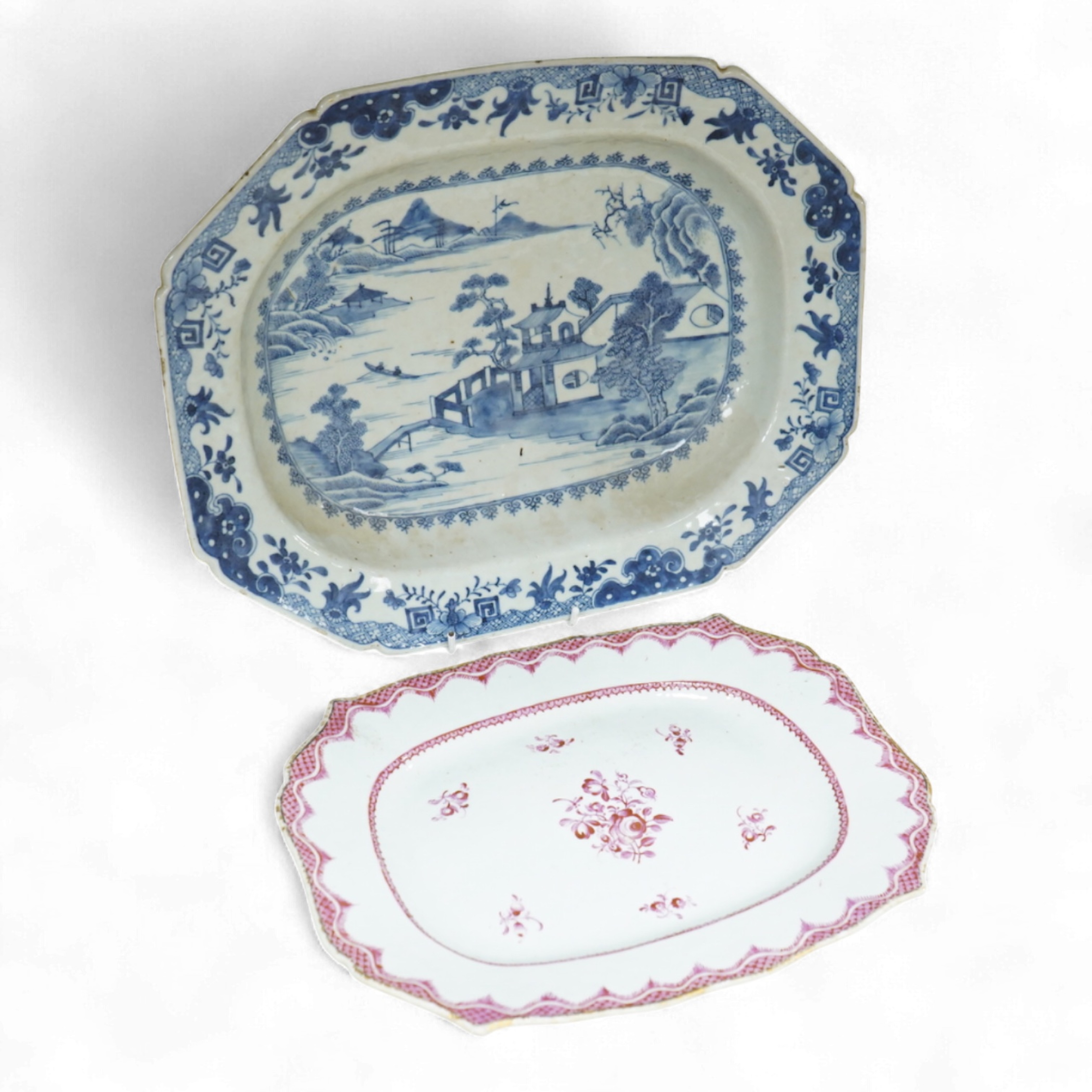 A late 18th century Chinese export blue and white serving dish and a similar famille rose serving platter, largest 37.5cm